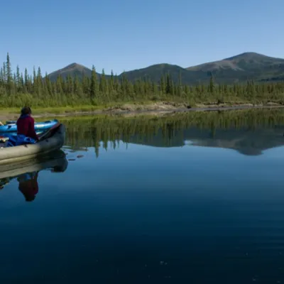 Canoeing downstream through Alaska's nature